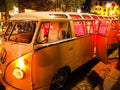 Yellow cream classic Volkswagen beetle limousine at night. Royalty Free Stock Photo